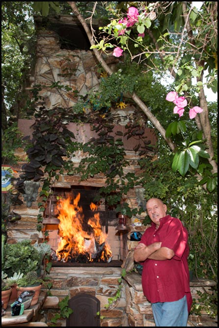 Horst Kugel Master Mason in front of outside fireplace